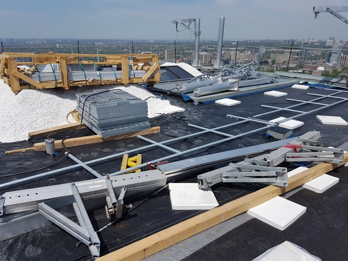 Roofing membrane, insulation and materials during construction